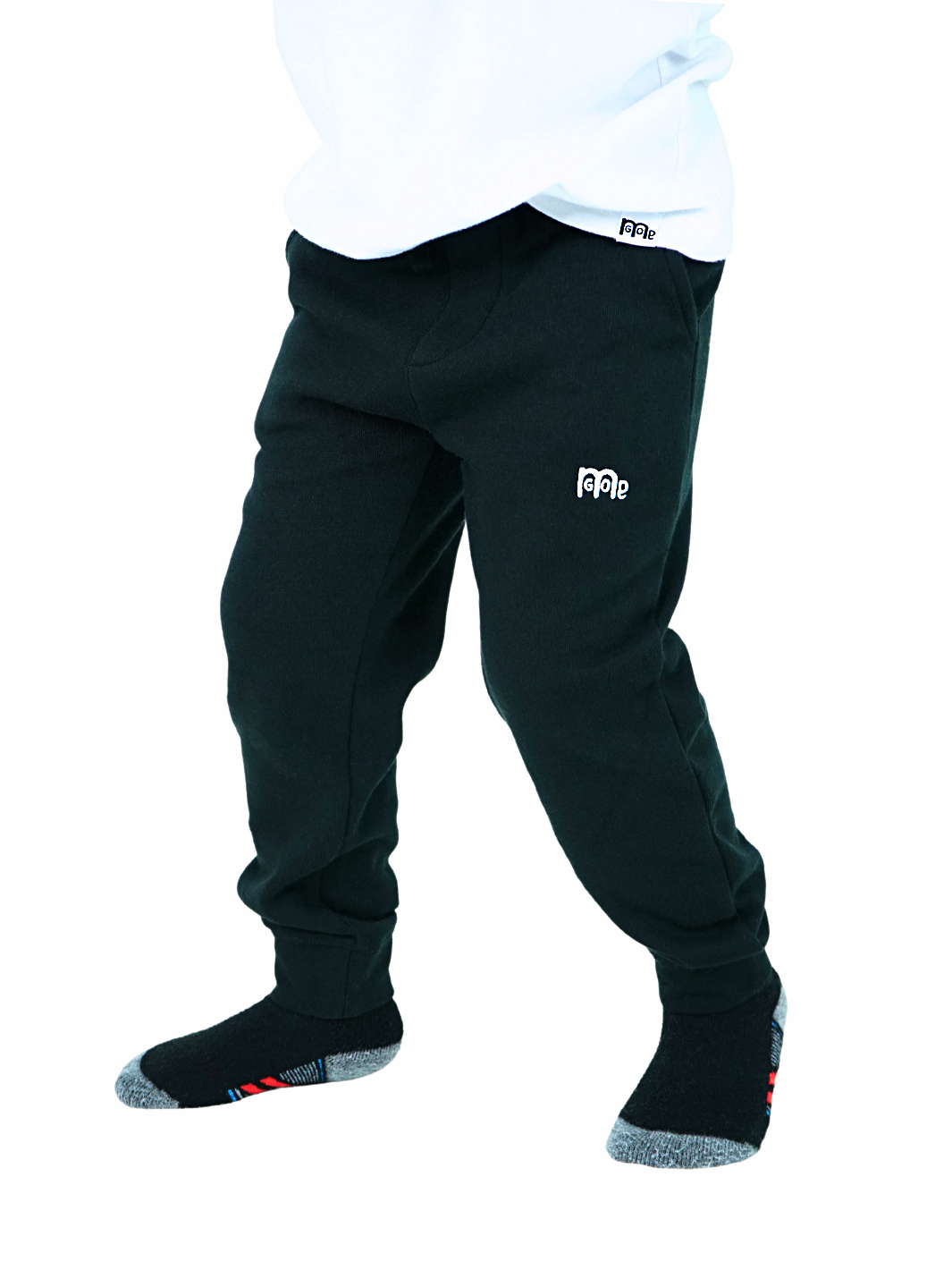 Toddler size Black jogger Sweatpants with elastic waistband, sewn fly detail, jersey-lined front pockets, stylish back pocket, and White GODinme logo.