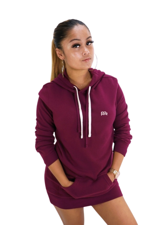 Burgundy GODinme Hoodie Dress made with superior quality of luxurious materials: Featuring our signature creme embroidered GODinme logo, two drawcords, and thumb hole cuff sleeves.
