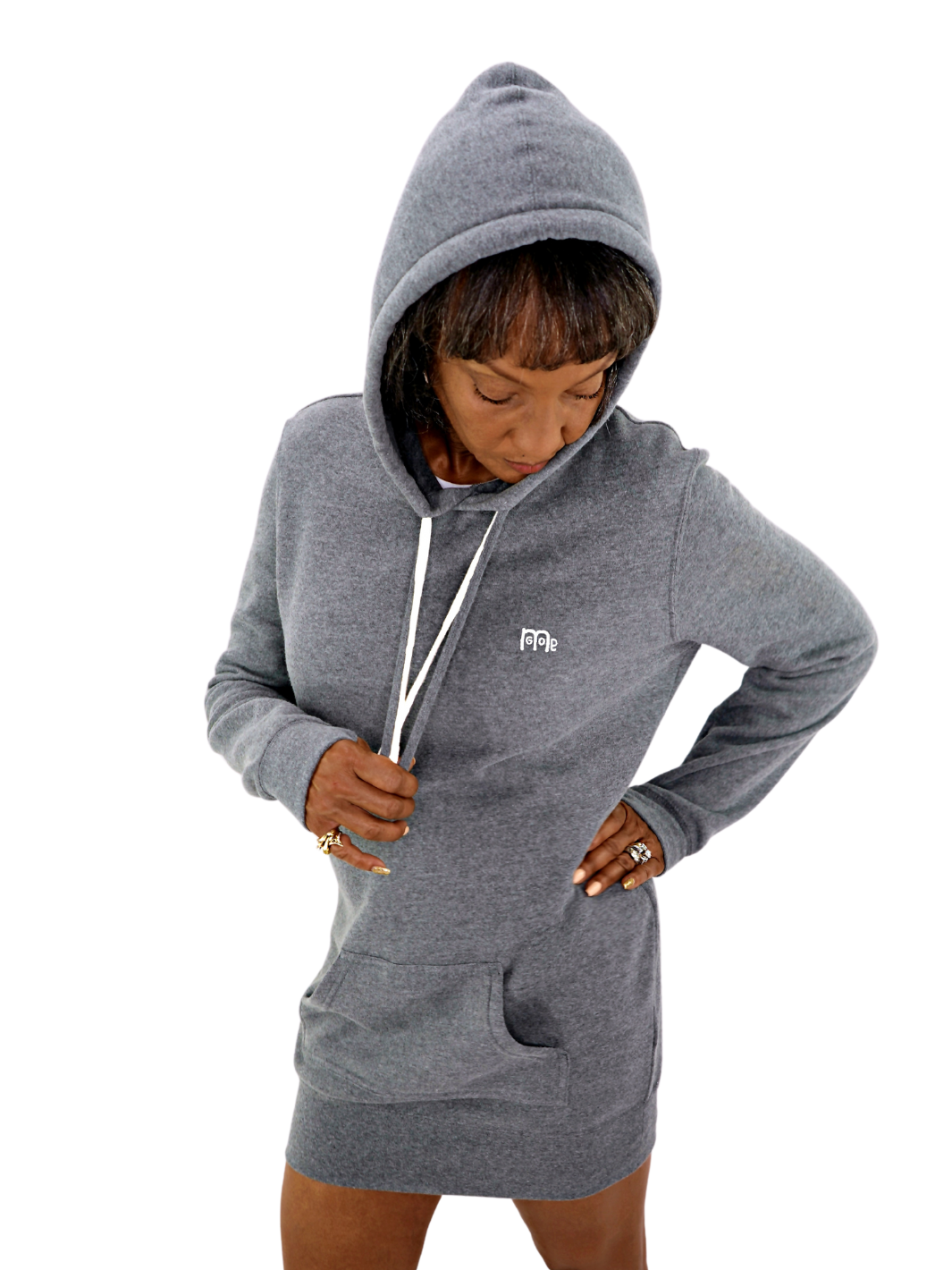 Grey GODinme Hoodie Dress made with superior quality of luxurious materials: Featuring our signature creme embroidered GODinme logo, two drawcords, and thumb hole cuff sleeves.
