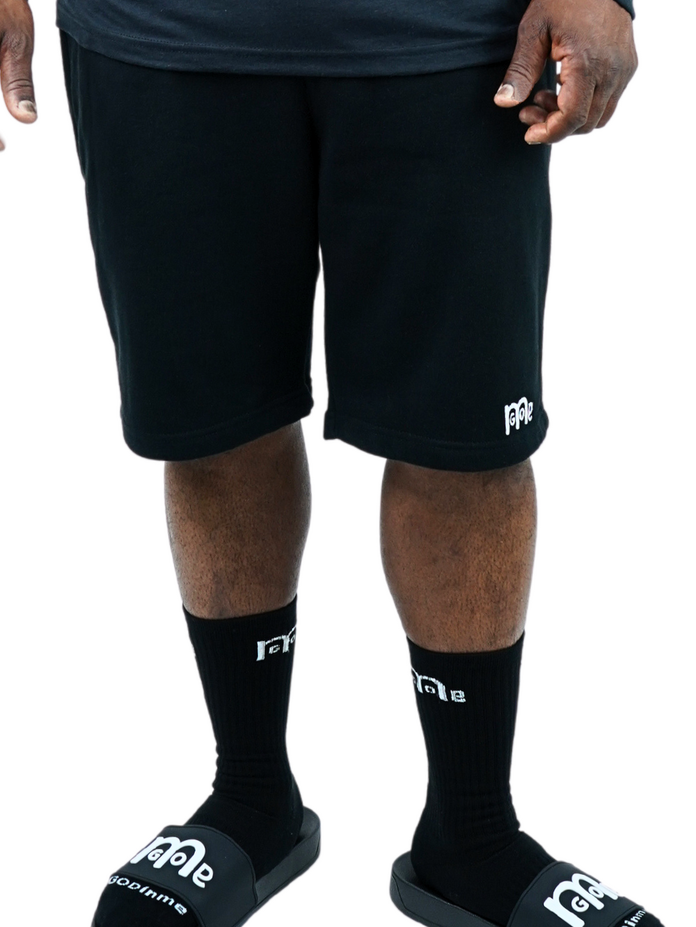Perfect for any occasion, these Black GODinme shorts provide an actively casual fit, jersey lined side and back pockets, elastic waistband, sewn eyelets, and fly details: providing the ultimate pair of shorts for any man of faith. But the White GODinme logo at left leg is the tell all, combining faith with fashion.