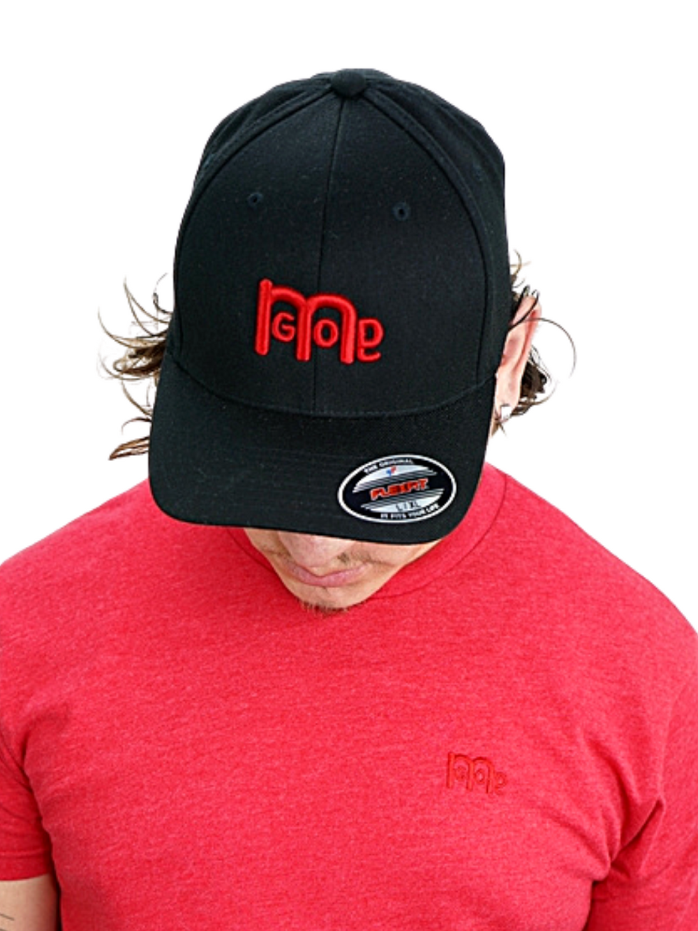 Smooth and sleek Black 6 panel Fitted Hat has curved Silver under visor with puff style GODinme logo embroidered in Red on front and flat style GODinme name embroidered on back.