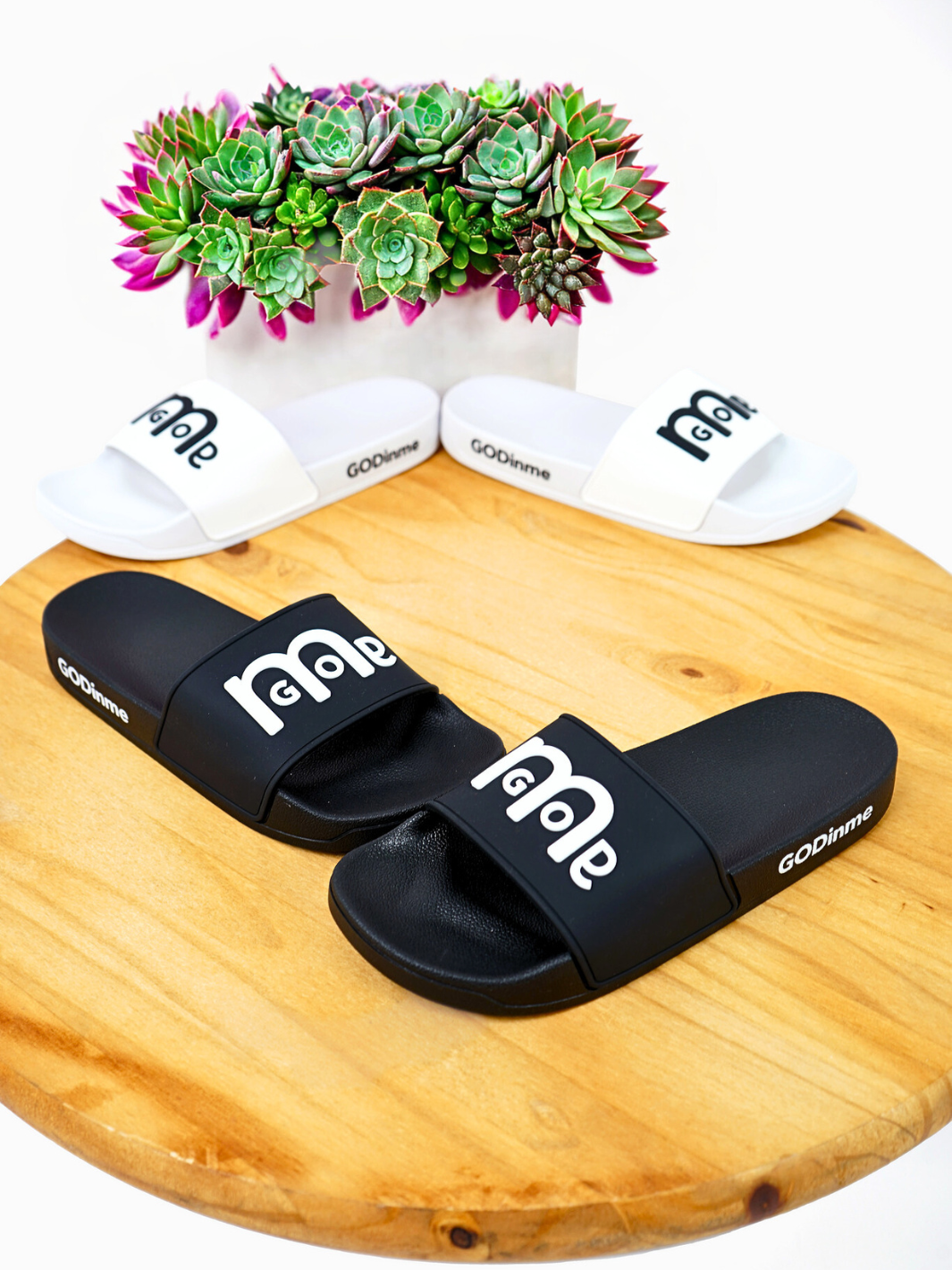 Men's GODinme Slides feature an embossed GODinme logo on front and signature GODinme on the outside heels.