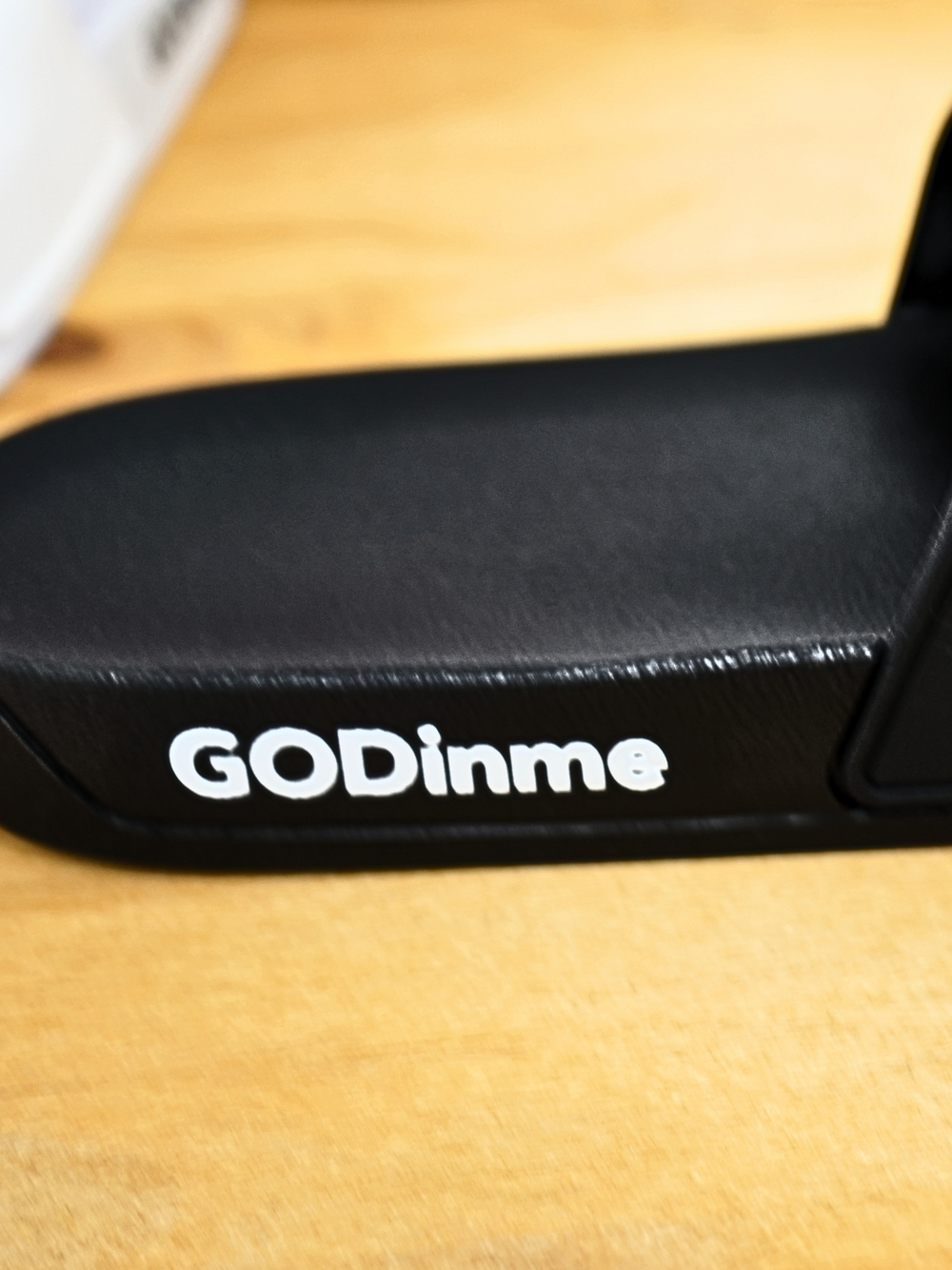 Men's Black GODinme Slides feature an embossed White GODinme logo on front and signature White GODinme on the outside heels.