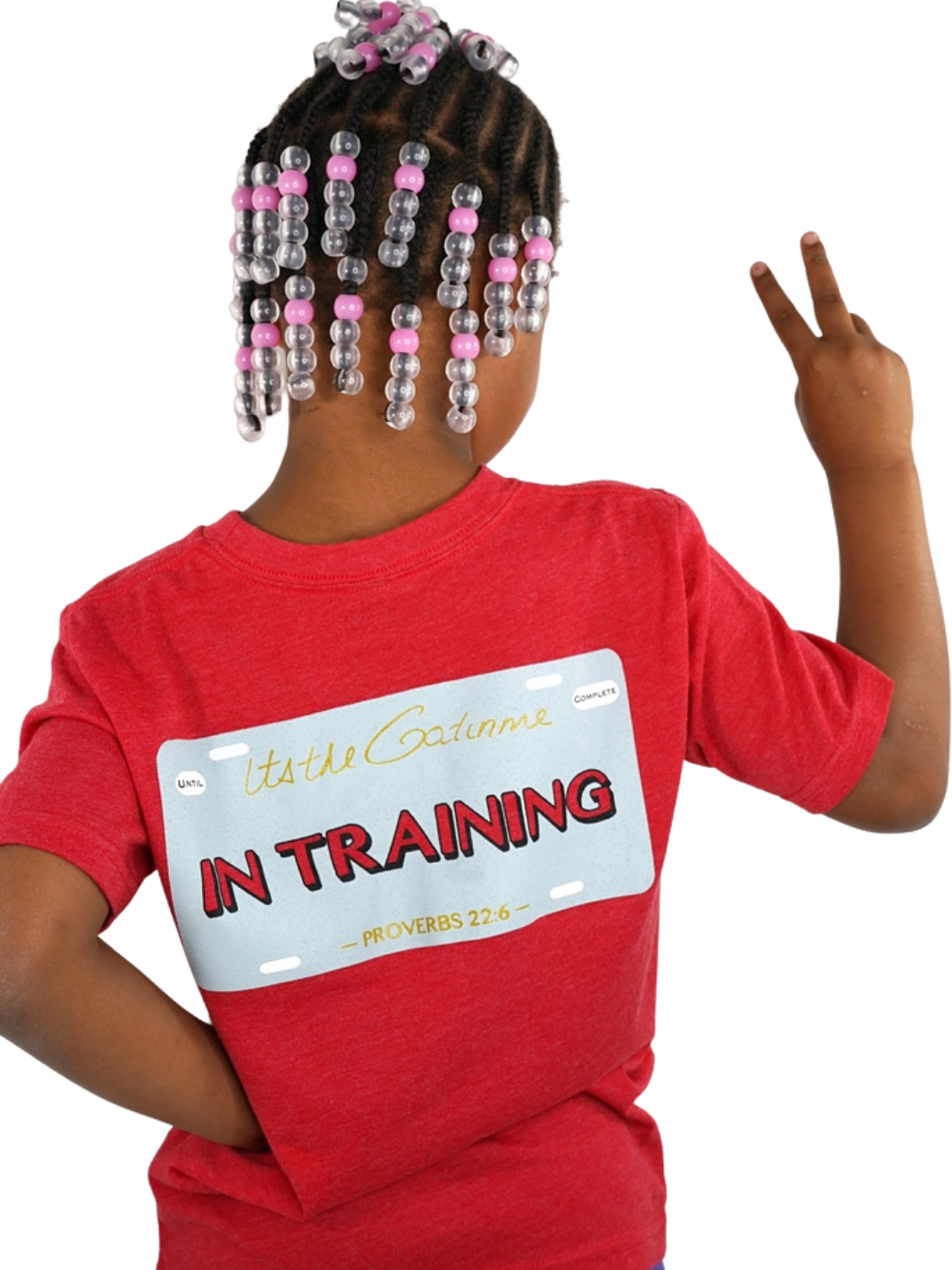 Red T-shirt with "In Training" and Proverbs 22:6 printed within license plate design on back and woven GODinme tag attached to bottom front 