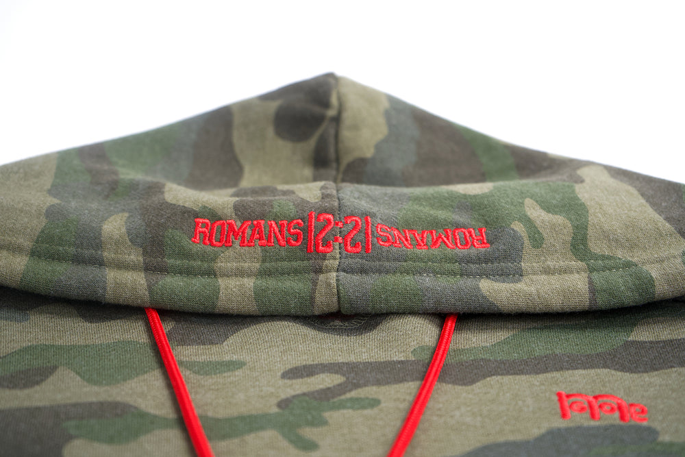 Women's Green Camouflage Tunic Top, can also be worn as a dress, offers a stylish cut design and superior comfort while representing GOD in you with Red logo at left chest and Roamns 12 : 21 on hood. Order Yours Today!