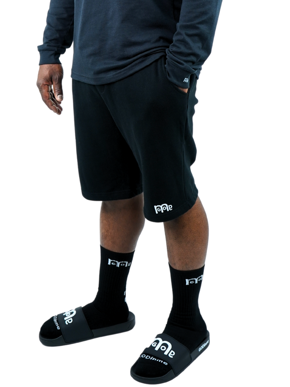 Perfect for any occasion, these Black GODinme shorts provide an actively casual fit, jersey lined side and back pockets, elastic waistband, sewn eyelets, and fly details: providing the ultimate pair of shorts for any man of faith. But the White GODinme logo at left leg is the tell all, combining faith with fashion.