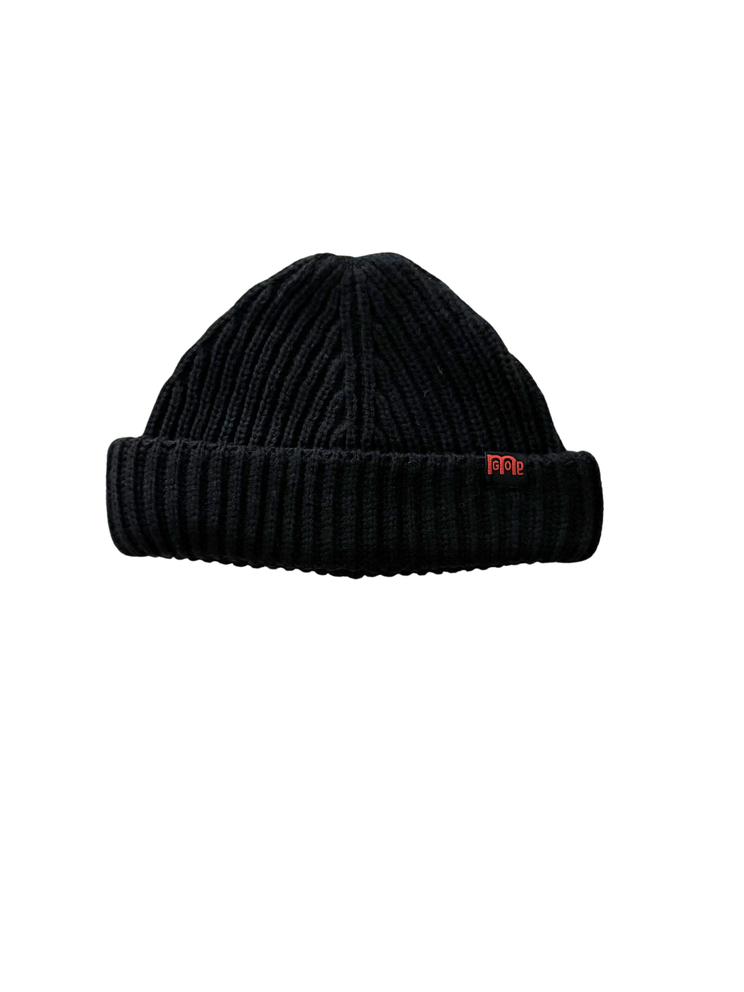 A Black Fisherman beanie made of smooth Polyester and warm Acrylic with signature tagged red logo on cuff.