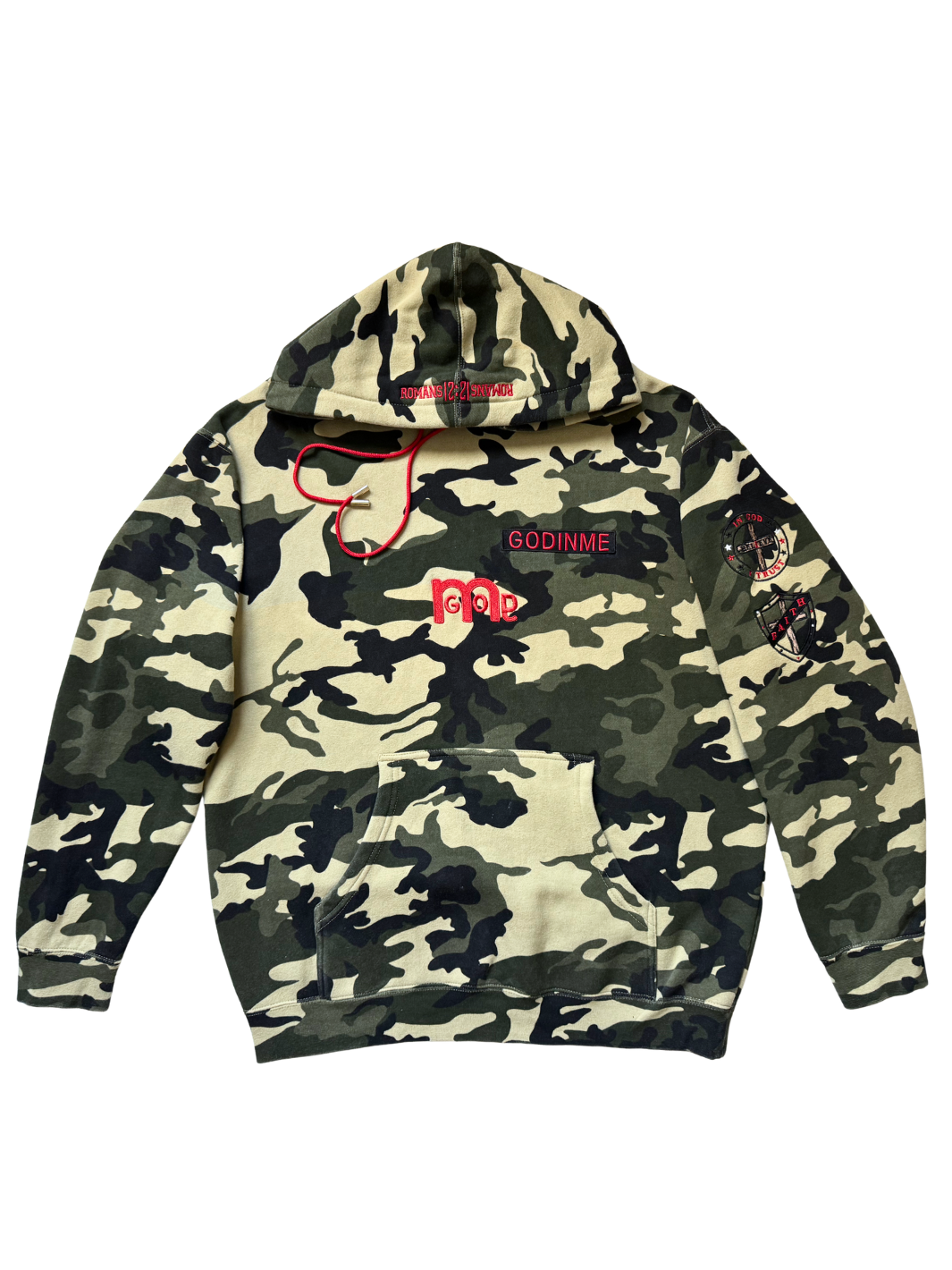flat display of a green, beige, and black camouflage  hoodie featuring  red embroidered details, including GODINME nameplate, GODinme logo on front, and two patches on left sleeve.
