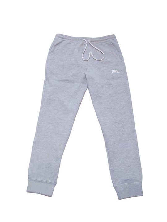 Experience the ultimate comfort in Men's joggers with GODinme! Made with premium quality fabric, these Grey GODinme sweat pants offer an elastic waistband for that perfectly relaxed fit. Featuring ribbing ankle cuffs, sewn eyelets, and the signature GODinme logo (in White) at left leg.