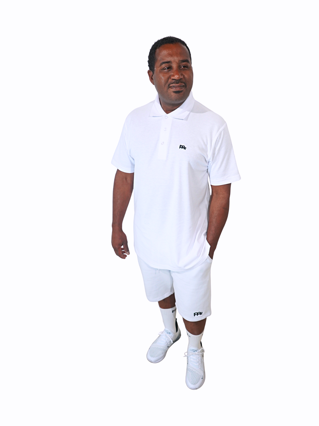 Classic-Fit White Polo Shirt with Black GODinme Logo: Perfect for any occasion.