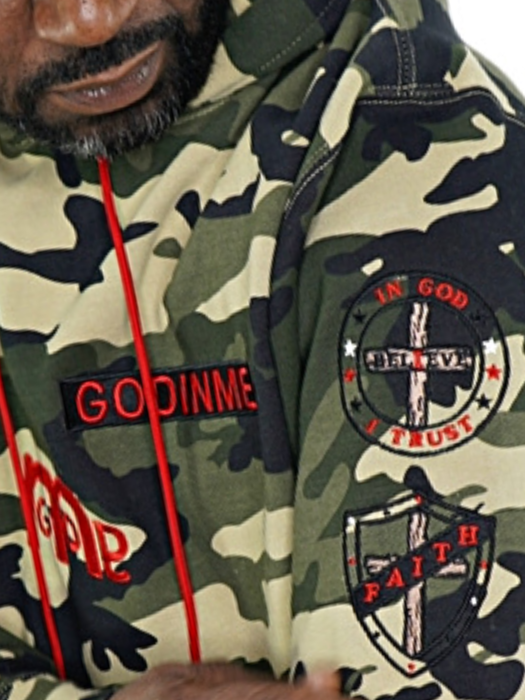 Each Righteousness hoodie has a big bold red logo mid chest, embroidered "In GOD we Trust " patch and embroidered shield of Faith patch on sleeves