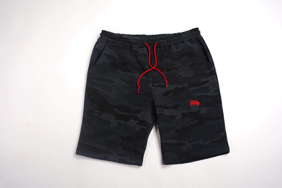These actively casual GODinme shorts come in a Black or Green Camouflage design. Complete with a bold embroidered logo and a shoestring draw cord in Red to make a faithful statement wherever you go.