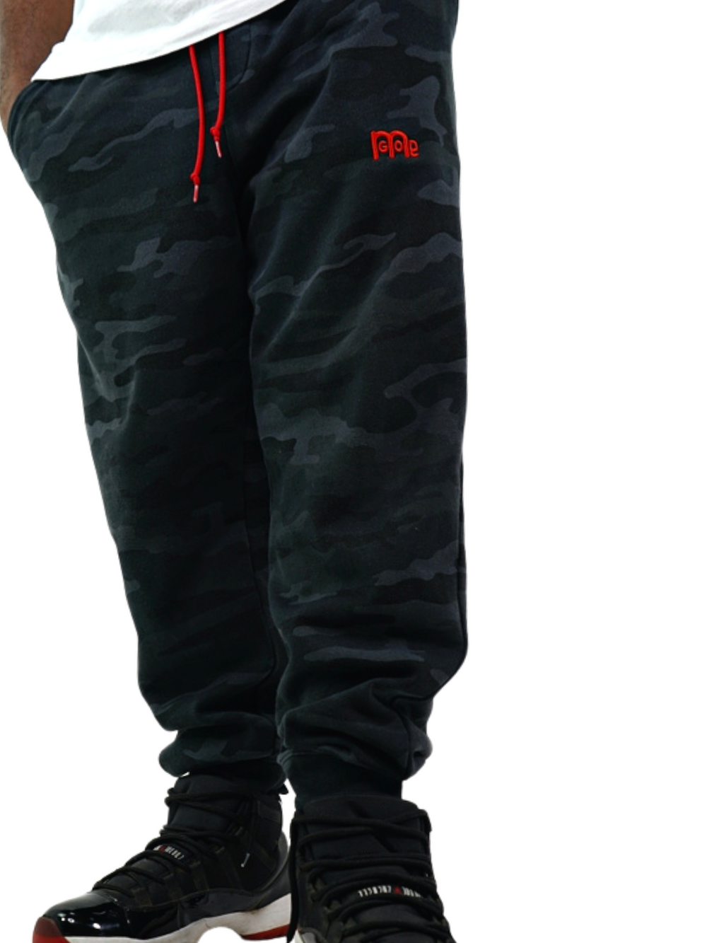 Experience ultimate comfort and style in these Men's GODinme Black Camouflage SweatPants from our Romans 12:21 Collection. Featuring the iconic Red GODinme logo, Red shoestring draw cord, and sewn fly details; its time to elevate your faith with these must-have joggers.