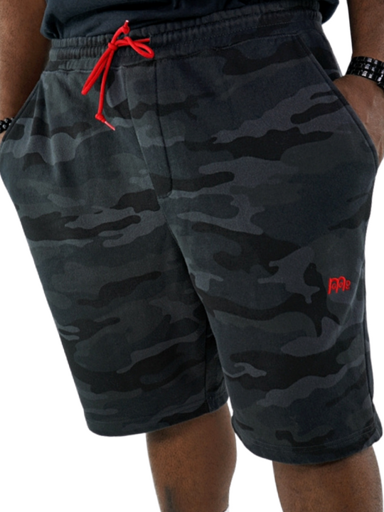 These actively casual GODinme shorts come in a Black or Green Camouflage design. Complete with a bold embroidered logo and a shoestring draw cord in Red to make a faithful statement wherever you go.